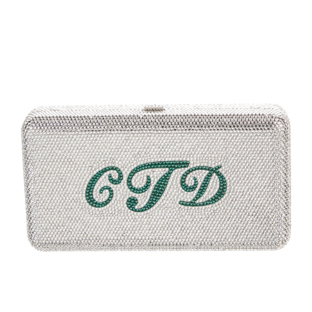 Judith Leiber clutch, decorated with silver crystals .